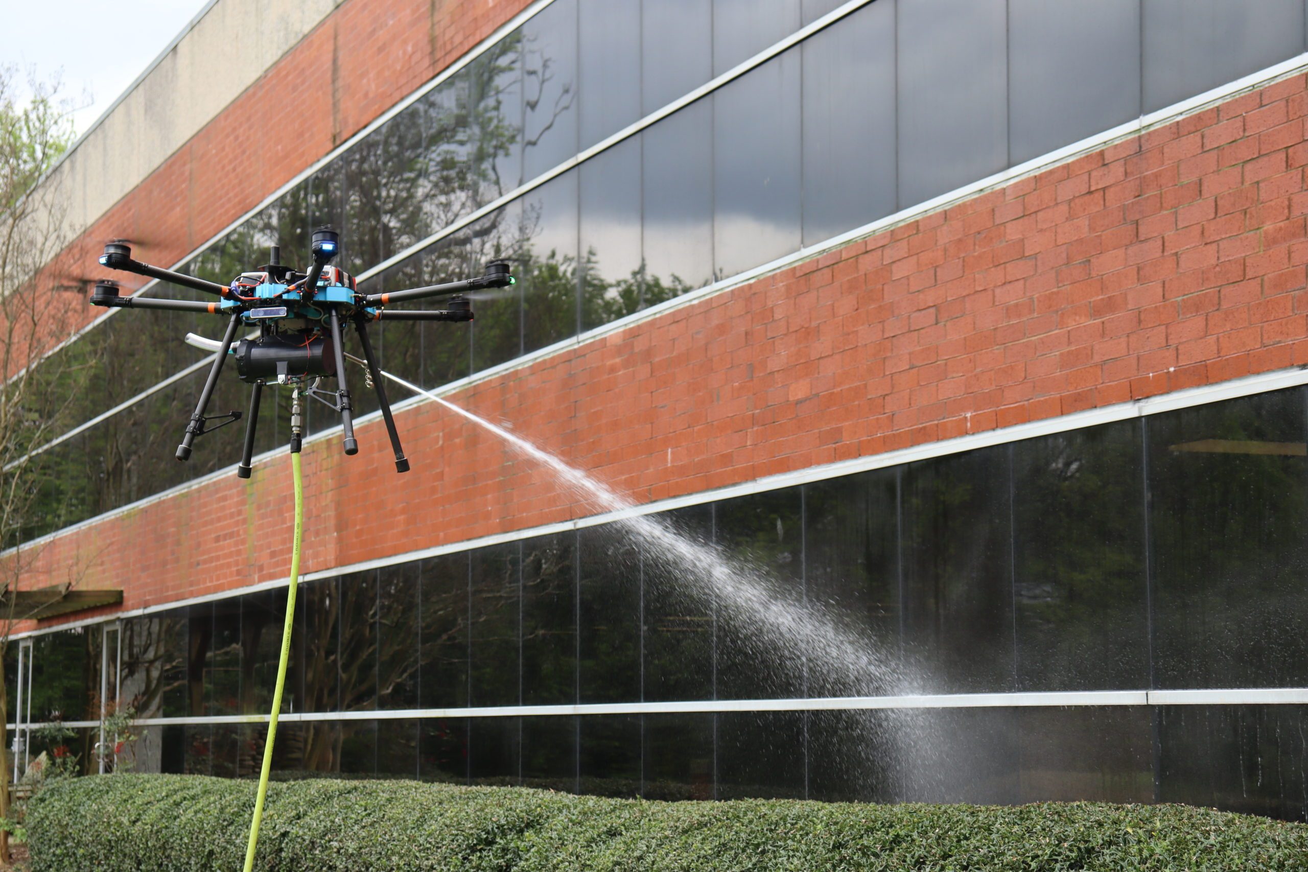 Drone window cleaning for high-rise building